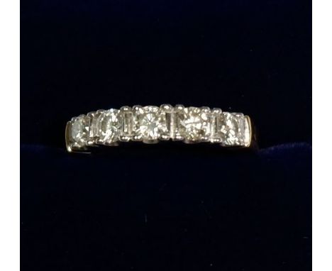 An 18ct gold five stone diamond ring, total estimated diamond weight 0.96ct, size O, 6g 