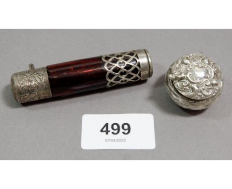 A Victorian ruby glass scent bottle with silver lid Birmingham 1924 and a small silver embossed pill box Birmingham 1902 