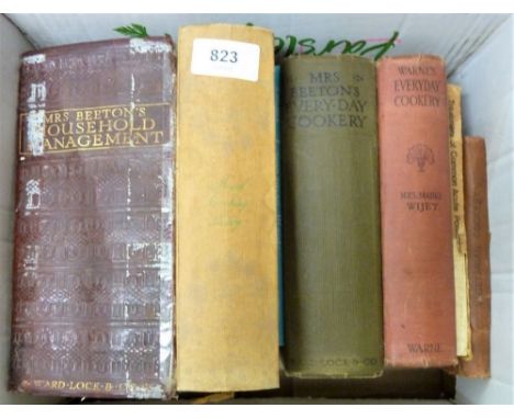 A box of various vintage cookery books 