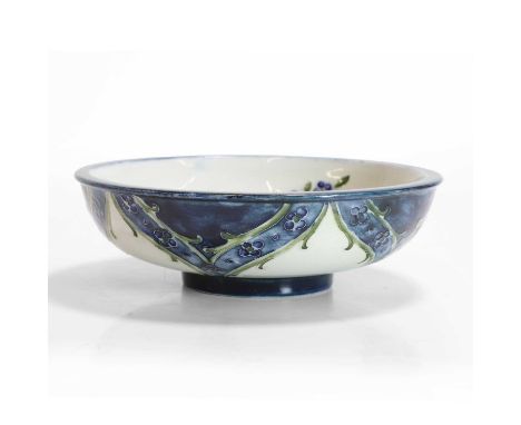 William Moorcroft (1872-1945), a 'Poppy' bowl, for James Macintyre &amp; Co., glazed earthenware, with printed factory stamp,