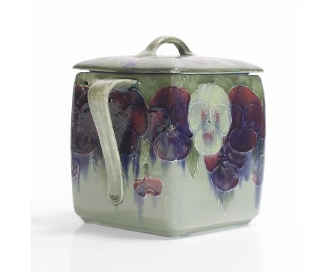 William Moorcroft (1872-1945), a 'Pansy' twin-handled covered box with removeable lid, for Moorcroft Pottery, glazed earthenw