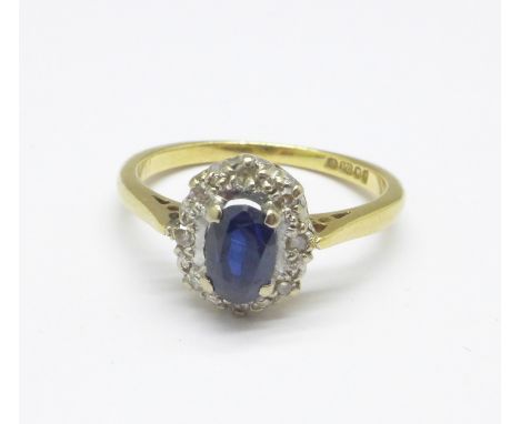 An 18ct gold, diamond and sapphire cluster ring, 2.8g, K 