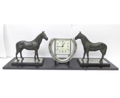 A Smiths equestrian clock garniture 