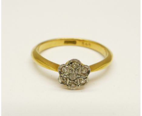 An 18ct gold and diamond daisy cluster ring, 2.3g, K 