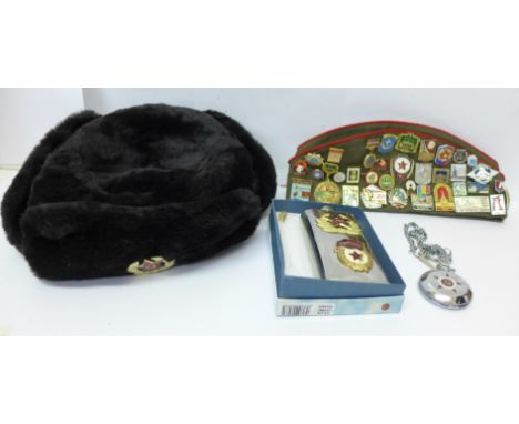 A Russian cap with enamel badges, other Russian items including a stopwatch, hip flask and hat 