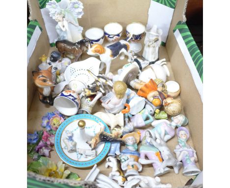 A Beswick figure of a stylised fox, Imari egg cups, half dolls, Royal Worcester candle snuff, a/f, and other figures includin