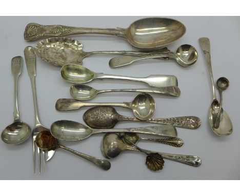 A Victorian silver spoon by George Adams, a collection of condiment spoons and a Georgian silver pastry fork, 220g 
