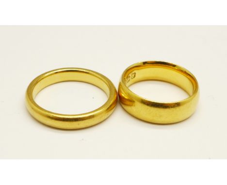 Two 22ct gold wedding rings, 14.7g, K and O 