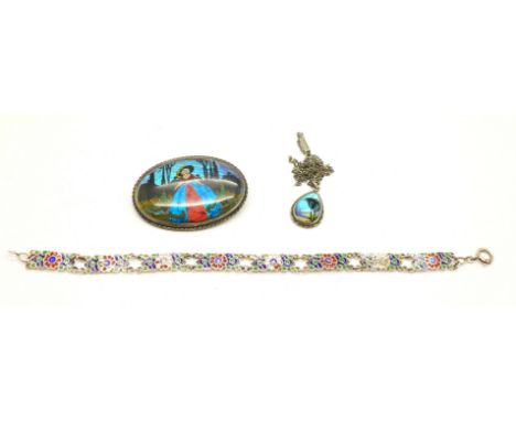 A silver butterfly wing brooch, pendant and chain and an enamelled bracelet, some enamel a/f 