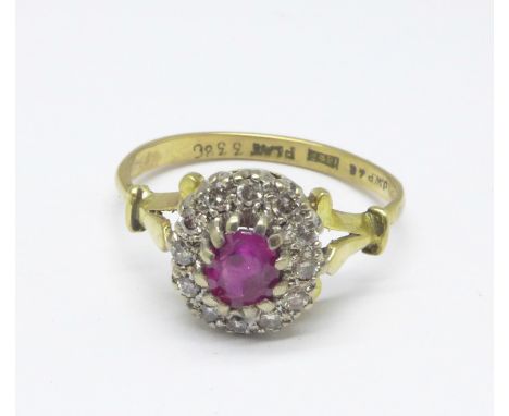 An 18ct gold, platinum set, ruby and diamond cluster ring, 3.4g, P 