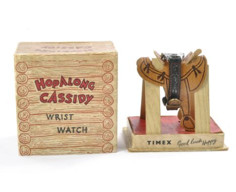 Timex 1955 Hopalong Cassidy Wrist Watch comprising original watch and strap attached to saddle inner packing piece. Absent of