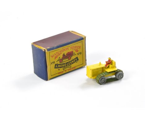 Matchbox Regular Wheels No. 8a Caterpillar Bulldozer. Yellow with red driver, metal rollers and green tracks. Generally good,