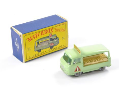 Matchbox Regular Wheels comprising No. 21c Commer Milk Delivery Truck. Pale green with silver plastic wheels. Green tint wind