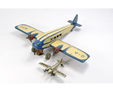 Mettoy 1930's Tinplate Mechanical Plane plus Post War Hammerer &amp; K�hlwein Prop Plane. Both with signs of wear. 