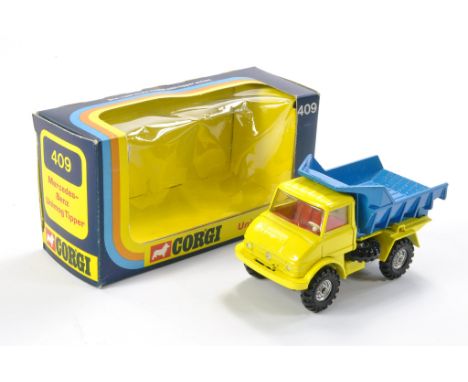 Corgi No. 409 Unimog Tipper. Yellow with red interior, blue tipper. Excellent with no obvious sign of wear in good to very go