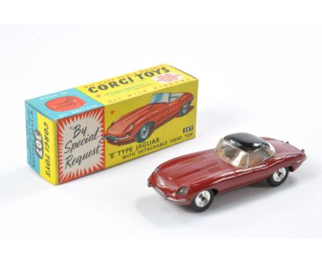 Corgi No. 307 Jaguar E Type with detachable hard top. Maroon with brown interior, black hard top. Generally excellent with li