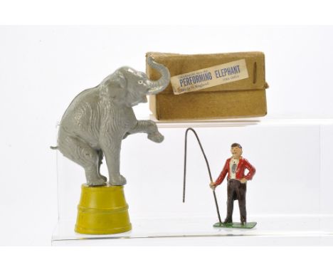 Charbens Vintage Lead Metal Performing Elephant Set comprising Elephant with foot raised, barrel and ringmaster with whip. Ge