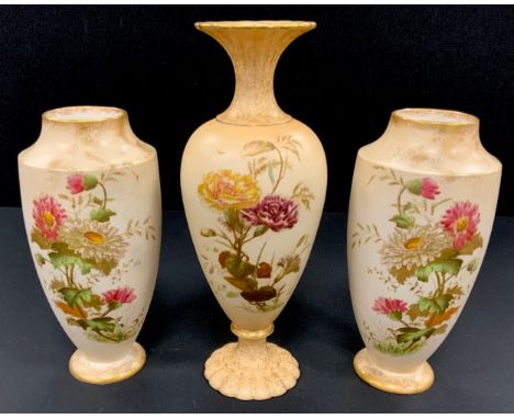 An early 20th century Wiltshaw &amp; Robinson Carlton ware blush pair of Chrysanthemum pattern vases, 20cm high,  another tal