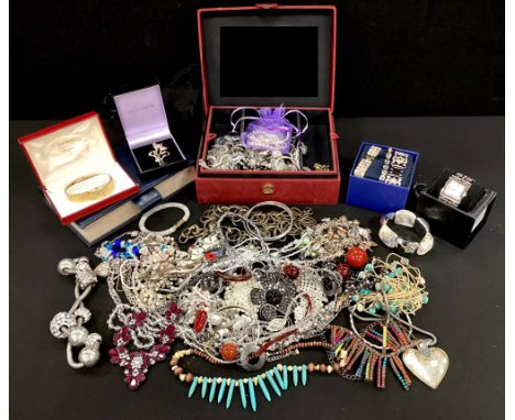 A selection of costume jewellery and watches, the costume jewellery includes bangles, necklaces brooches, earrings etc, also 