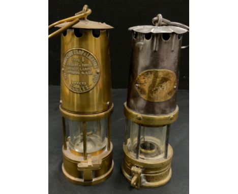 W.E.Teale &amp; Co Swinton, Lanc cast iron and brass miners lamp, Eccles projector lamp (2).