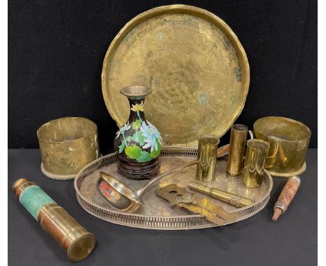 A pair of trench art vases, other shell cases, telescope, silver plated oval tray, soup ladle, cloisonné vase, plaster wall b