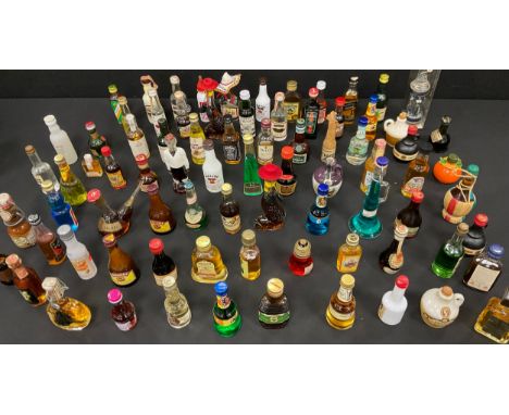 A collection of alcoholic miniatures, Whisky, Brandy, Rum, Gin, Vodka etc, inc Oban Malt, Johnnie Walker Black label, Wood's 