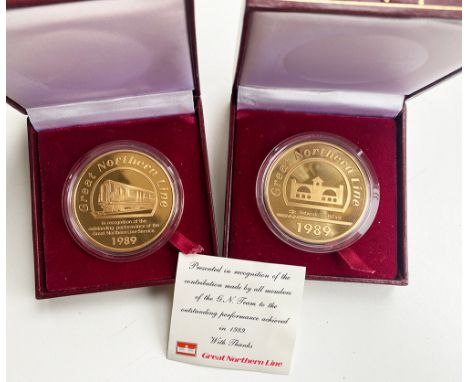 Great Northern Line recognition Medallions a pair one having the presentation card dated 1989. Issued by the company in recog