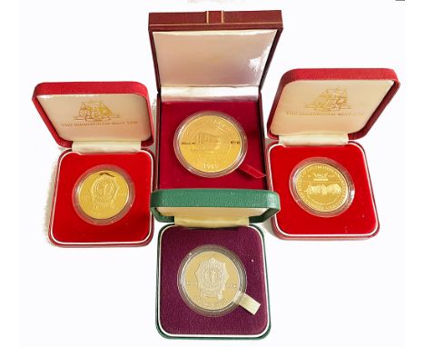  A pair of ASLEF Doncaster centenary Medallion 1889 - 1989 gold colour produced by The Birmingham Mint. Together with a simil