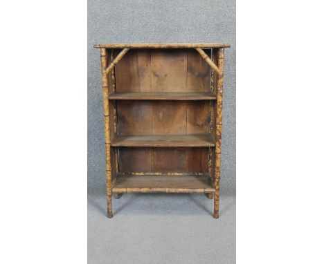 A vintage bamboo dwarf open bookcase. H.104 x W.73 x D.30cm 