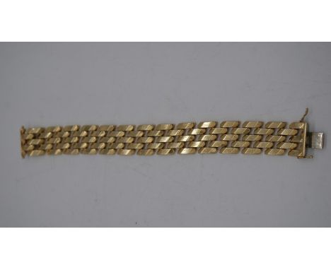 A 14 carat gold vintage articulated faceted design mesh bracelet with hidden push clasp and double safety catch. Stamped 585,
