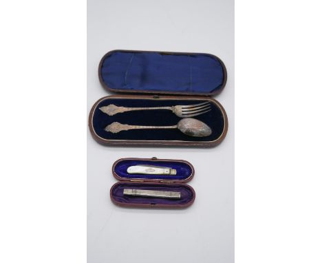 A leather cased set of silver spoon and fork with engraved floral pattern by George Unite, Birmingham, 1866 along with a silv