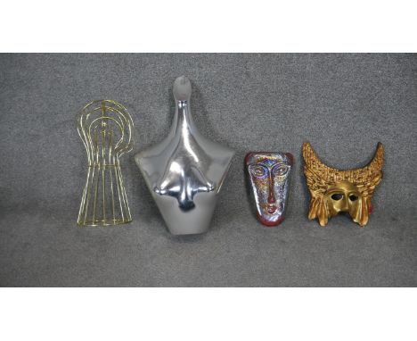 A collection of mannequins and masks. Including a vintage chrome effect clothes mannequin, a gilt ceramic Venetian mask, a wi