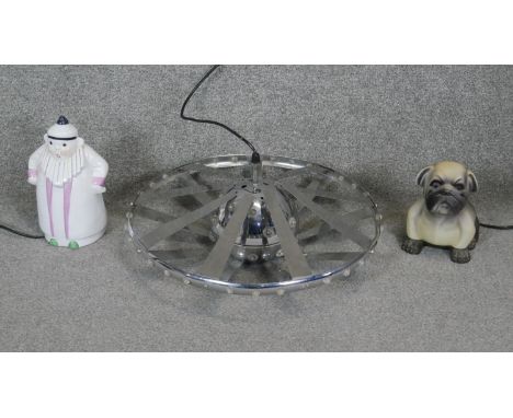 Three lamps. Including a vintage chrome UFO ceiling lamp, a plastic bull dog lamp and a ceramic clown lamp. 