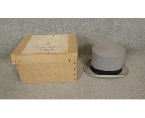 A vintage Herbert Johnson top hat and gloves in it's original box. 