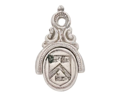 A 17th century silver swivel seal matrix, the oval double sided swivel bezel bearing to one side the intaglio crest of a demi