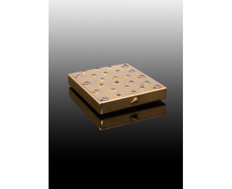 A gold and sapphire vanity case by Cartier, circa 1920, of rectangular form, set to the front and base with repeating sapphir
