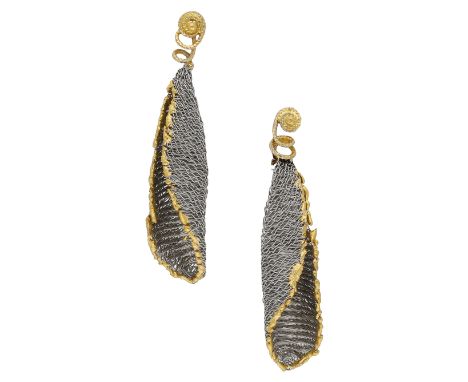 A pair of platinum earrings by Catherine Martin, 1999, the meshwork leaves of bicolour design and with scrolling tendril surm