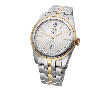 Tudor. A stainless steel and gold automatic wristwatch with date and bracelet, Ref. 57003, Glamour, circa 2014. Movement: cal