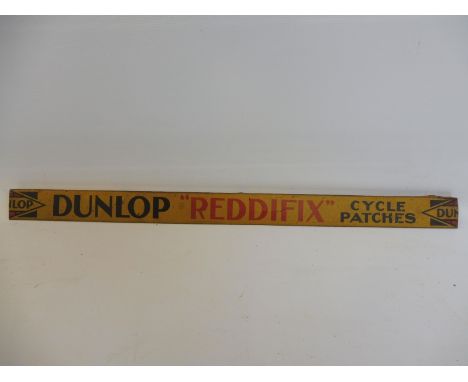 A Dunlop Reddifix cycle patches advertising shelf strip.
