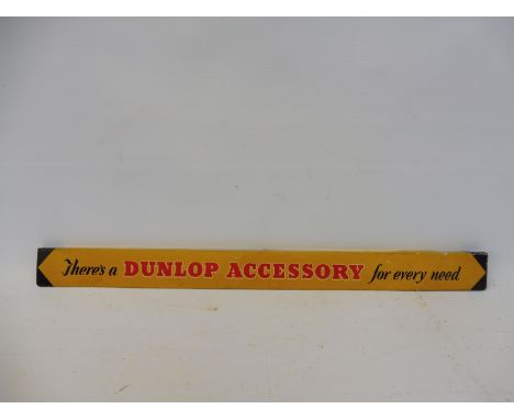 A Dunlop Accessories tin shelf strip.