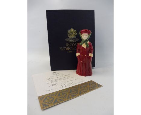 A rare and unusual Royal Worcester fine bone china candle snuffer of a female motorist in Edwardian style clothing, fully box