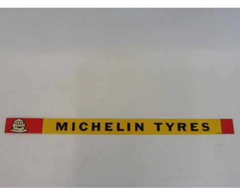 A Michelin Tyres shelf strip in near mint condition, dated May 1964, possibly new old stock, 18 1/2 x 1 1/4".