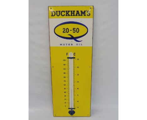 A Duckham's 20-50 Motor Oil enamel thermometer, in very good condition, 12 x 36". 