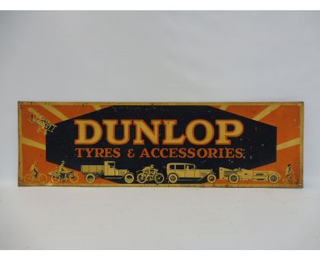 A very rare pictorial Dunlop Tyres and Accessories advertising sign with images of bicycles, motorcycles, a bi-plane and vehi