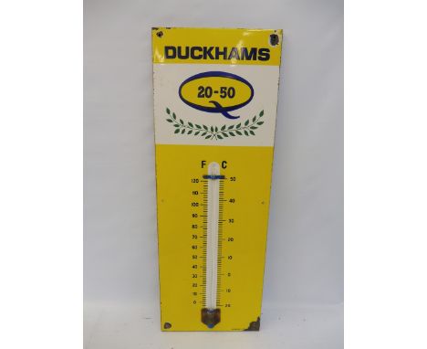 A Duckhams 20-50 enamel thermometer by Burnham of London, 13 x 36". 