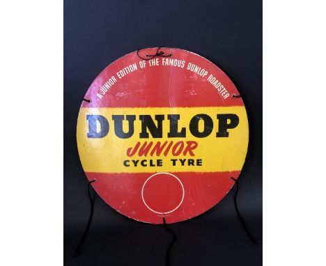 A Dunlop Junior Cycle Tyre cardboard tyre insert advertisement, 18" diameter.