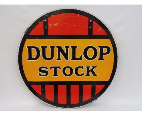 A Dunlop Stock circular double sided enamel sign with excellent gloss to one side, 24" diameter. 