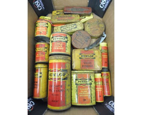 A quantity of Dunlop tins. 