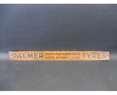 A Palmer Tyres shelf edge strip.
