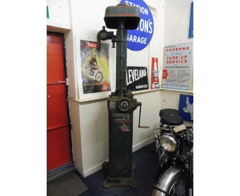 A Bowser Red Sentry hand operated petrol pump, in very sound original condition.